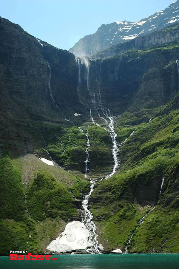 A breathtaking waterfall amidst a lush mountain, reminding me of 