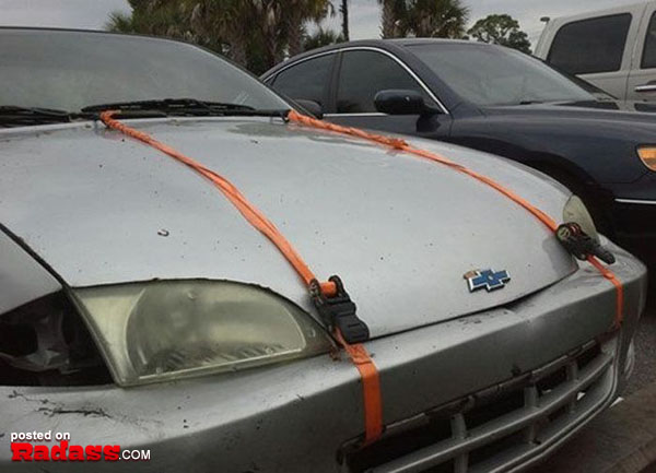 A car with orange straps attached to it.