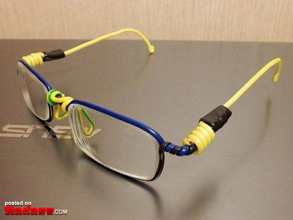 A pair of glasses with yellow and blue cords, perfect for those in need of 50 Redneck Remedies.