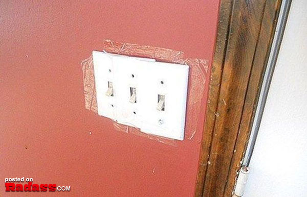 A light switch with a piece of tape on it for 50 Redneck Remedies to Help You in Times of Need.