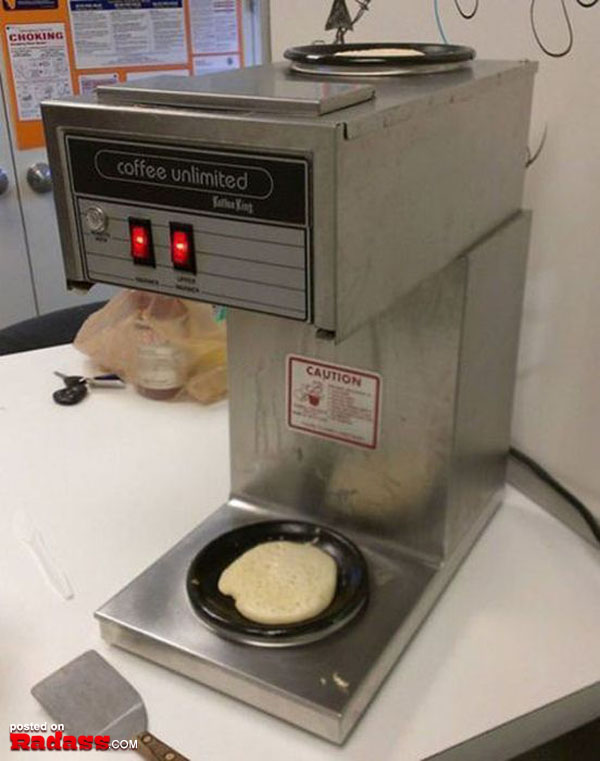 A machine that makes pancakes is sitting on top of a table, ready to assist in times of need.
