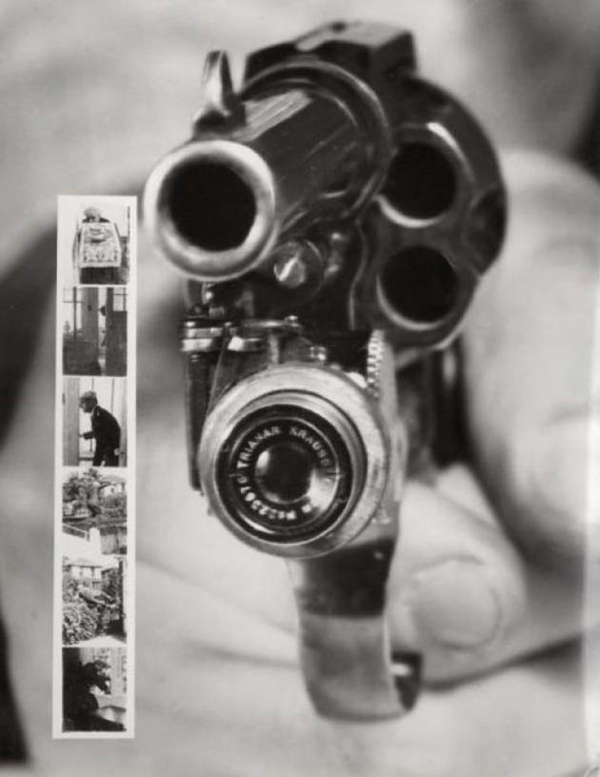 A black and white photograph depicting a hand holding a gun, showcasing one of the ridiculously strange but cool inventions from the early 1900’s.