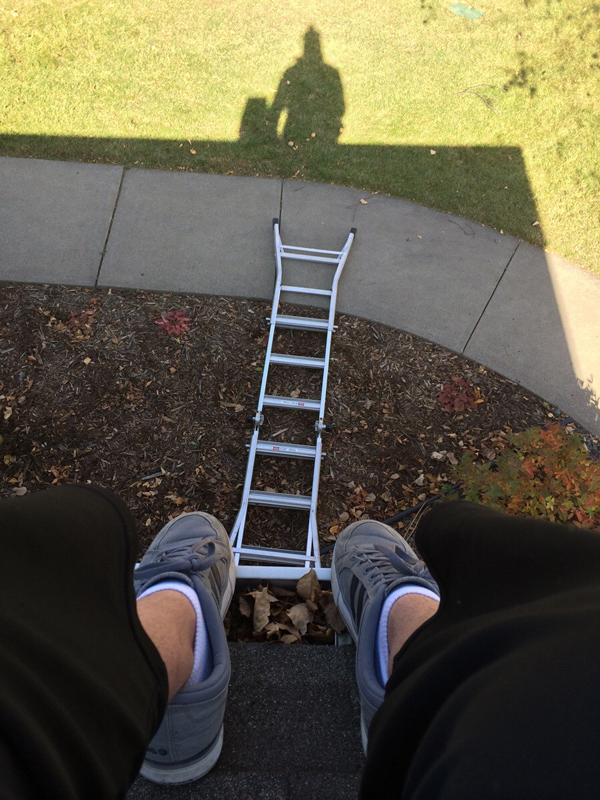 A person's feet on a ladder, finding reasons to smile.