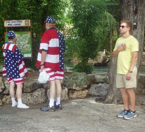 A group of people dressed up in American flag costumes, known as Patriots.