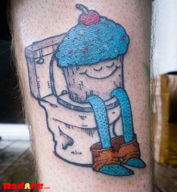 A whimsical tattoo featuring a cupcake on a toilet, capturing the spirit of living in the moment.