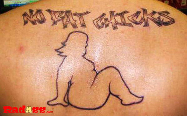 Living in the Moment: A woman's tattooed back with a provocative message.