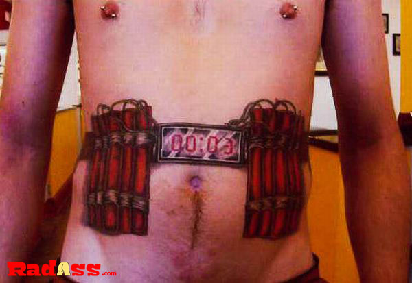 A man with an unconventional tattoo on his stomach showcases a love for unique body art.