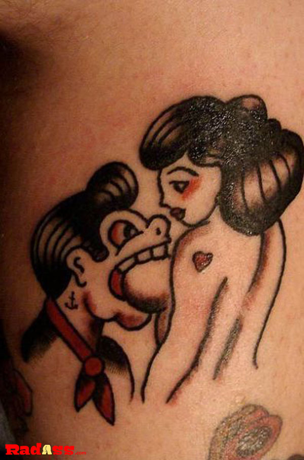 A captivating tattoo capturing a passionate moment between two individuals.