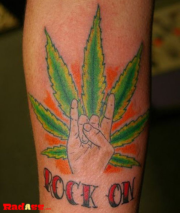 A tattoo of a marijuana leaf with the word 