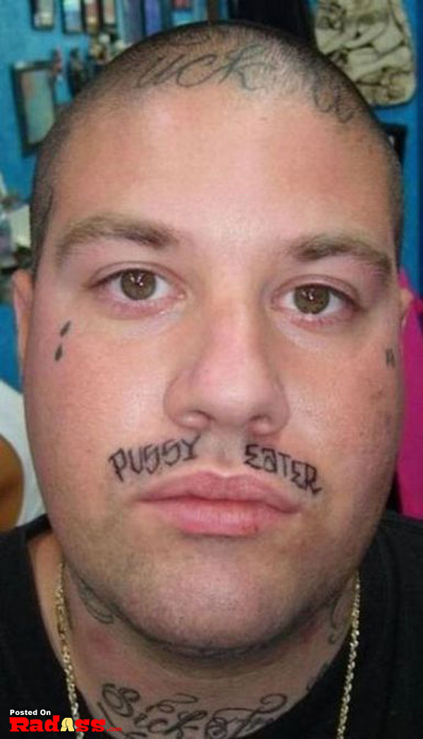 A man with a permanent tattoo on his face.