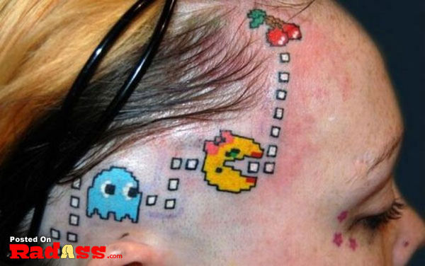 A girl with a permanent pacman tattoo on her head.