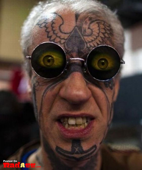 A man with permanent tattoos on his face.