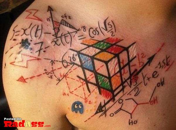 A man with a permanent rubik's cube tattoo on his chest.