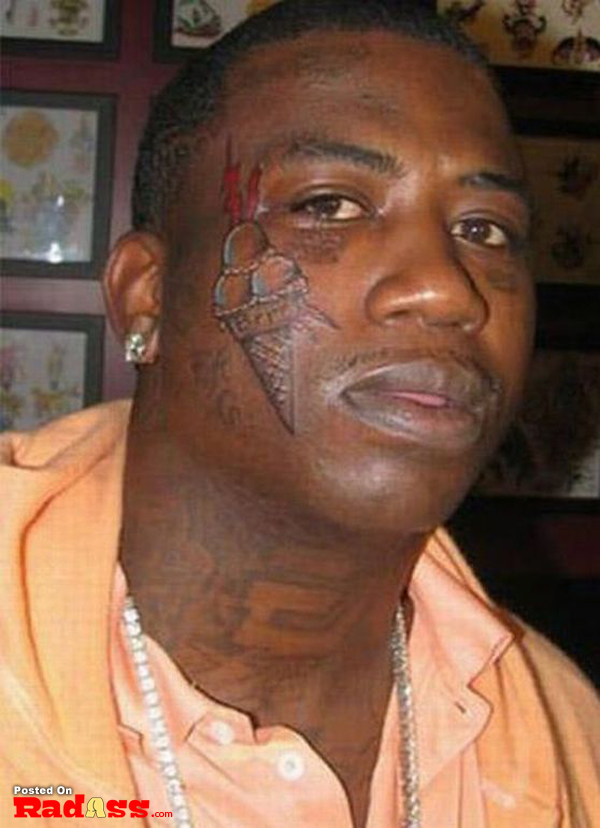A man with a permanent face tattoo.