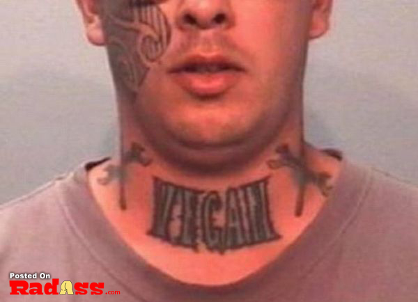 A man with a permanent tattoo on his neck.