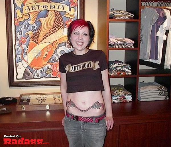 A woman exhibiting tattoos.