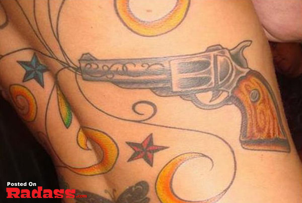 A woman with a gun tattoo on her back is one of the 32 people packing for life.