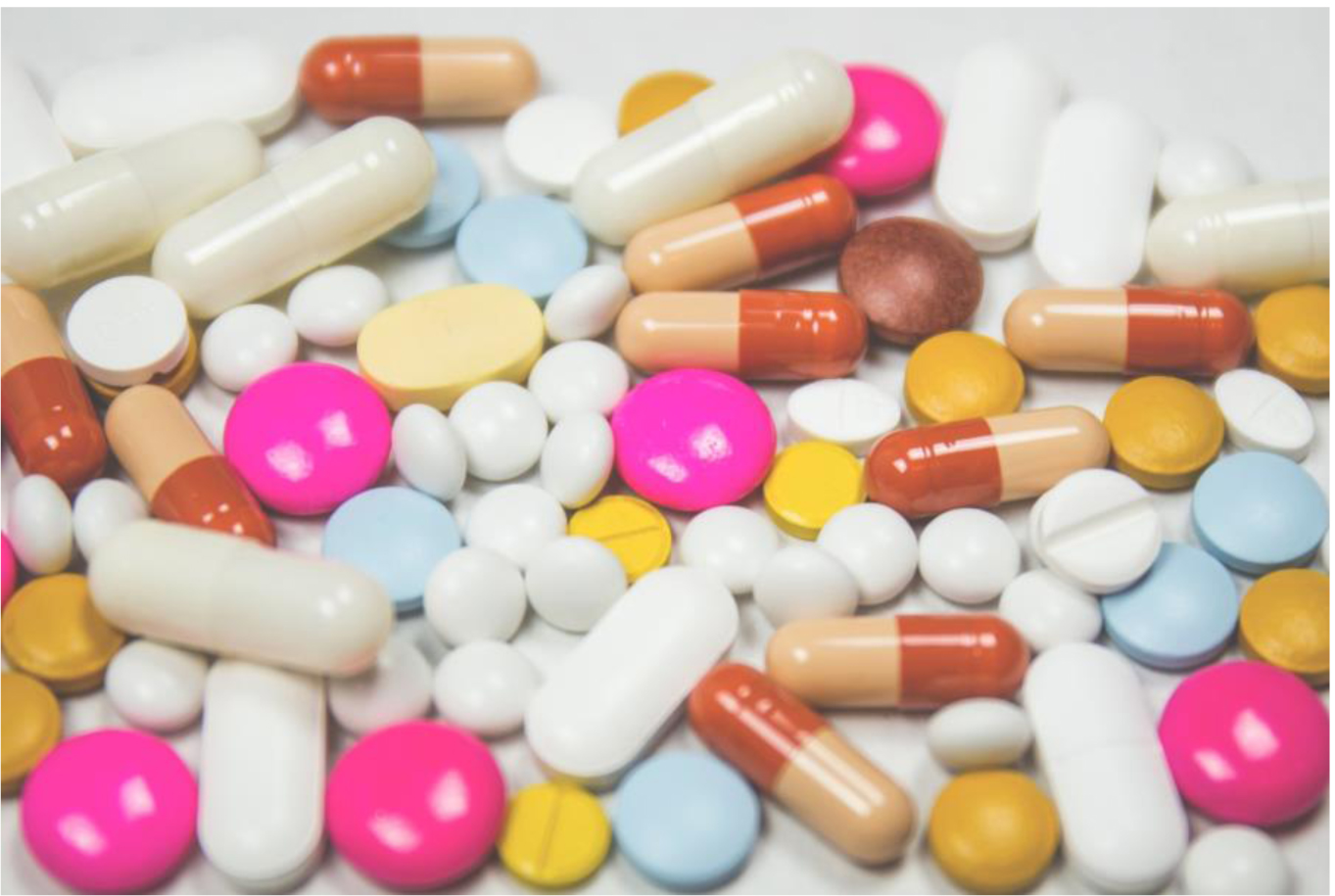 A pile of pills and capsules illustrating the nocebo effect.