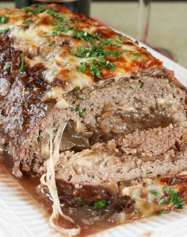 A comforting meatloaf with onions and cheese, perfect for those who appreciate comfort food.
