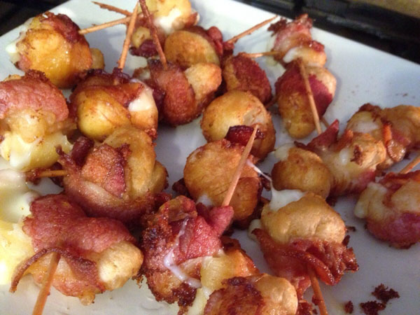 Bacon wrapped cheese skewers on a plate - prepare for Food Porn.