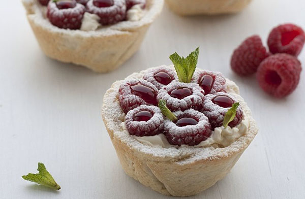 Warning: Food Porn Ahead - Raspberries and cream mini tarts.