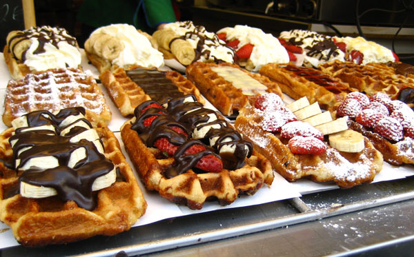 A mouthwatering display of waffles adorned with delectable toppings.