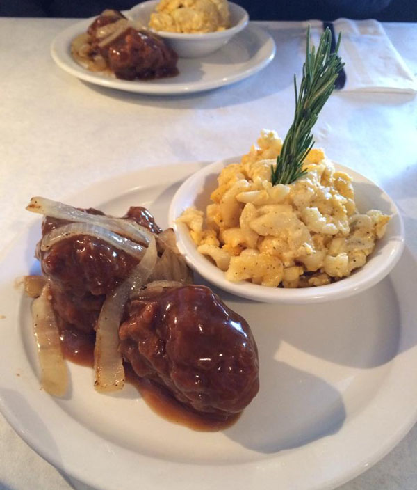 A plate of mouthwatering meatballs and indulgent macaroni and cheese - Food Porn ahead!