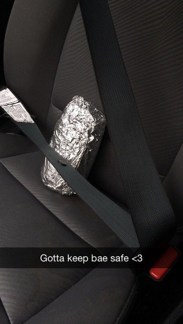 A hilarious snapchat featuring a seat belt adorned with a piece of tin foil that is too good to disappear.