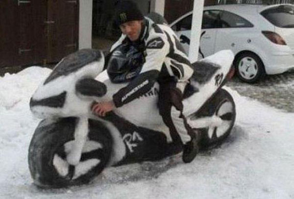 A man creates a snow motorcycle, providing relief from winter.