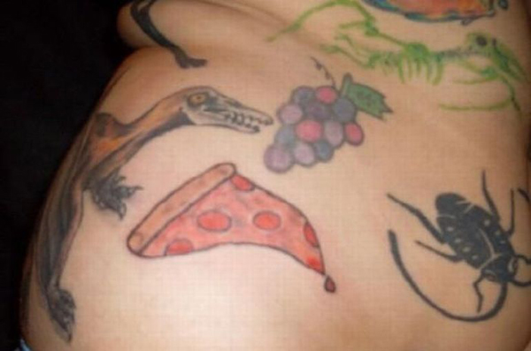 A woman's pizza and dinosaur tattoos offer comfort for a better life.