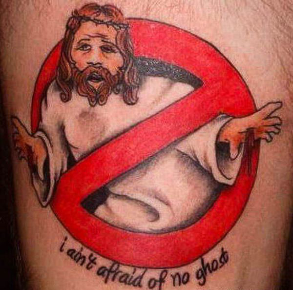 A Jesus tattoo to make you feel better about your life, featuring a sign saying 