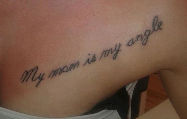 A woman with a tattoo that says my mom is my angle, offering inspiration through tattoos.