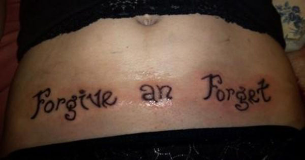 A woman with a stomach tattoo promoting forgiveness.