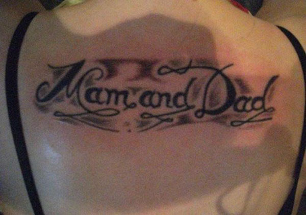A woman's back with a mom and dad tattoo, aiming to make you feel better about life.