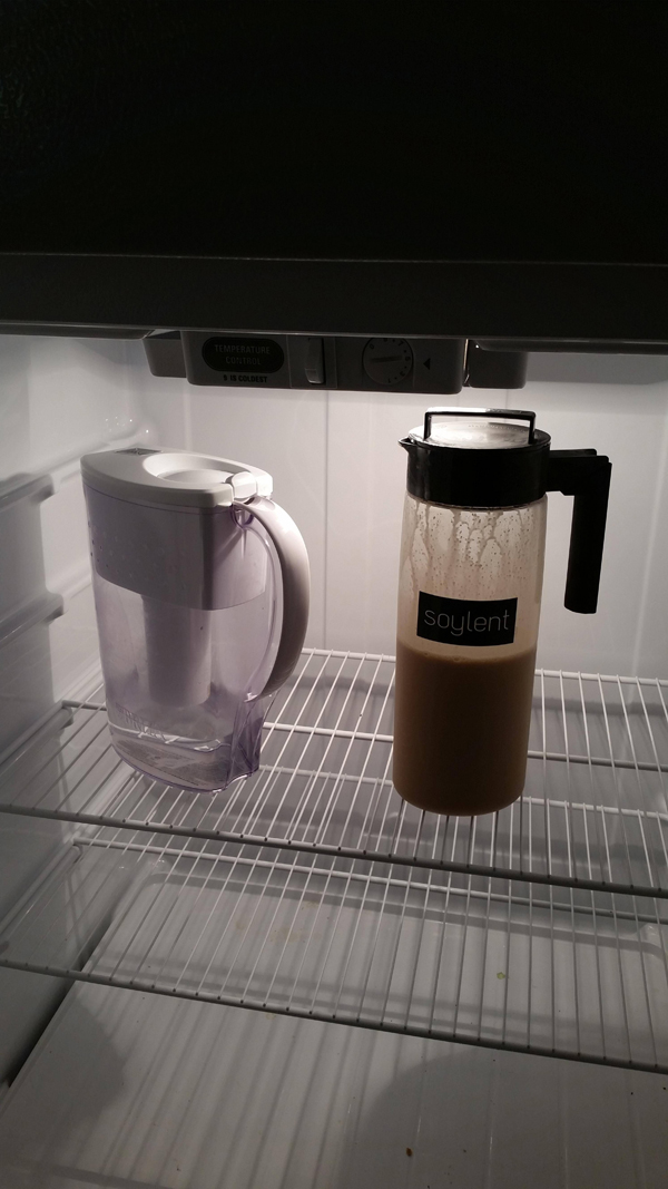 An open refrigerator with a coffee mug, revealing who you are according to your fridge.