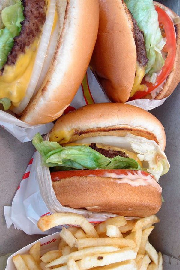 Awesome visual suggestions: Three hamburgers and french fries in a box.