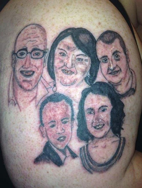 A woman's back tattoo featuring a family - one of the 20 Terrible Tattoos That Will Make You Happy You Are You.