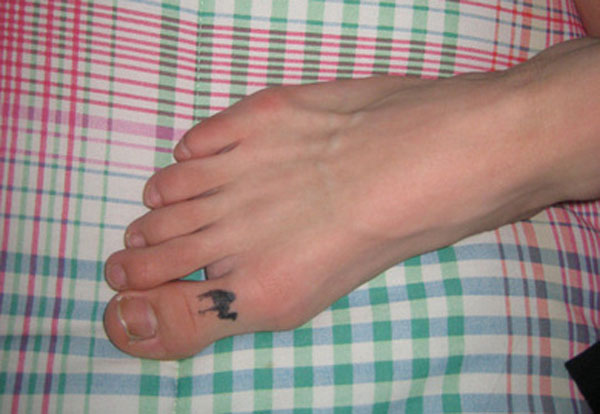 A person's foot tattoo that might make you happy.
