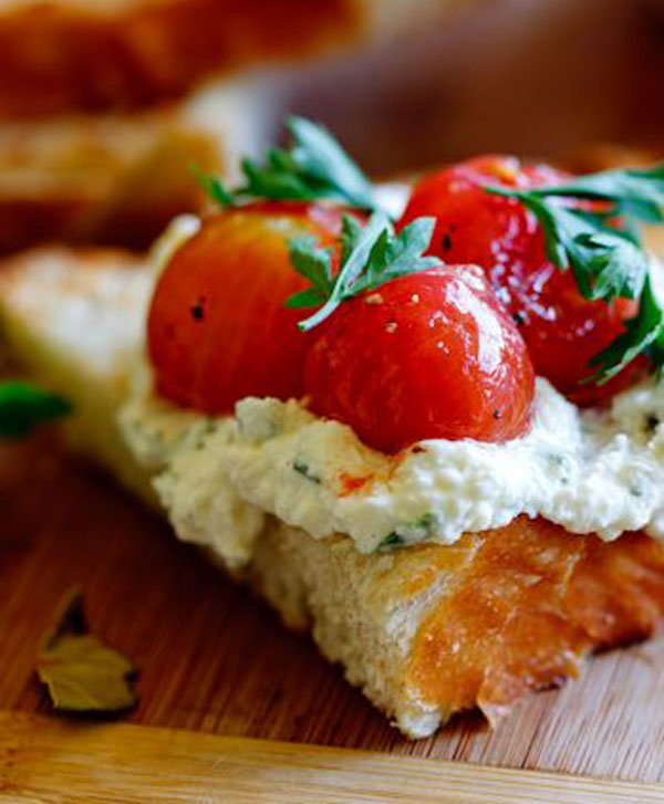 Food Porn - A tantalizing image of a tomato and cream-covered slice of bread guaranteed to make you hungry.