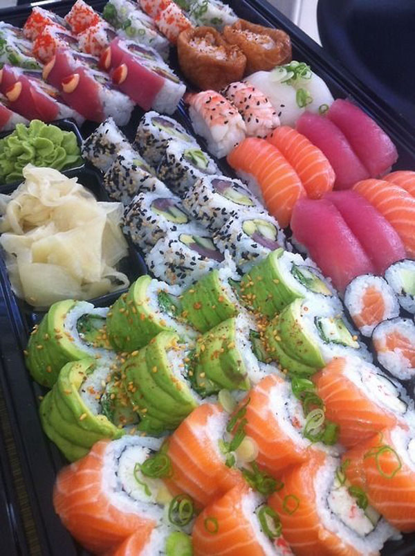 A diverse tray of sushi, perfect for satisfying your hunger and indulging in some food porn.