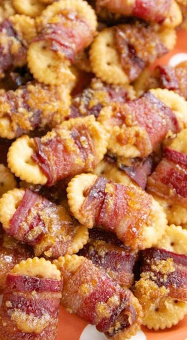 Game Day Grub Ideas: Bacon wrapped crackers on an orange plate.