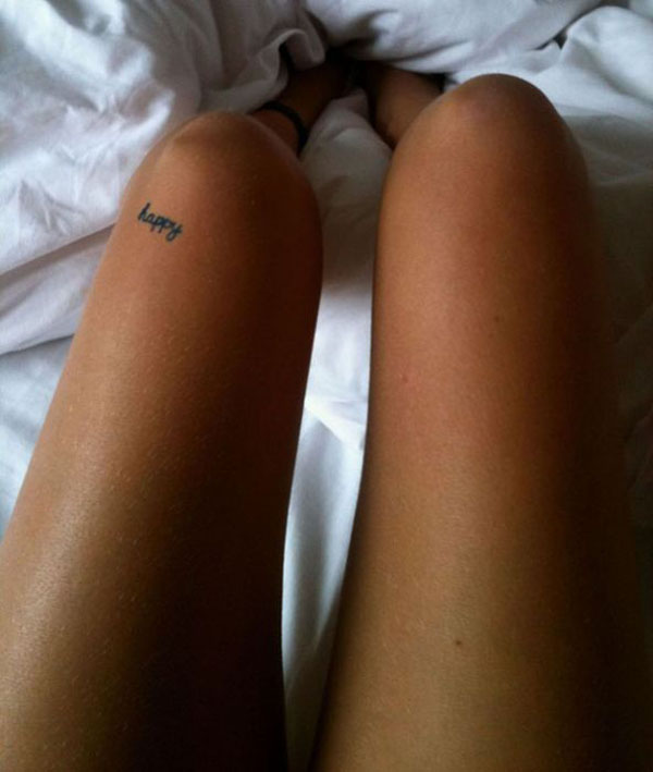 tattooed legs, happy
