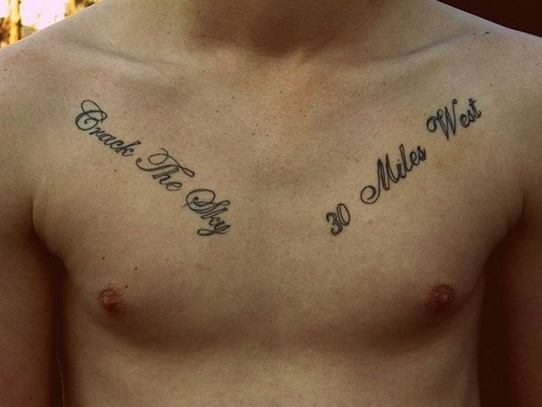 Tattooed chest.