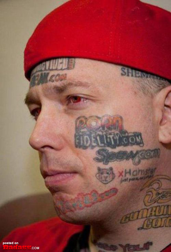 A man with many **regrettable** tattoos on his face.