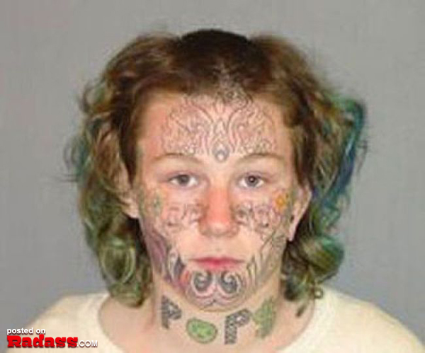 A woman with regrettable face tattoos.