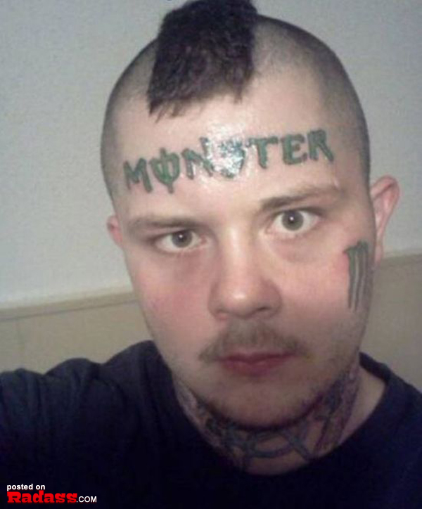 A man with a regrettable monster tattoo on his head.