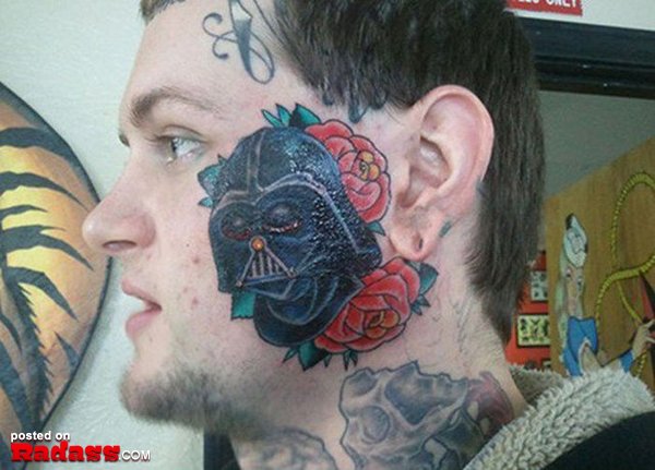 A man with a regrettable darth vader tattoo on his face.