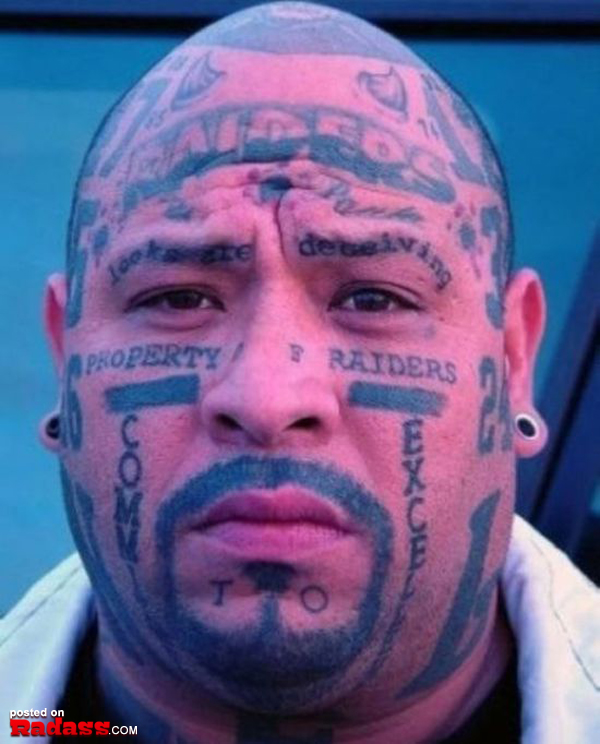 A man with forever regrettable tattoos on his face.