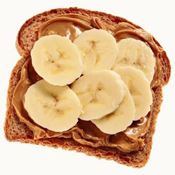 A mouthwatering piece of toast topped with creamy peanut butter and luscious banana slices, a true foodgasm.