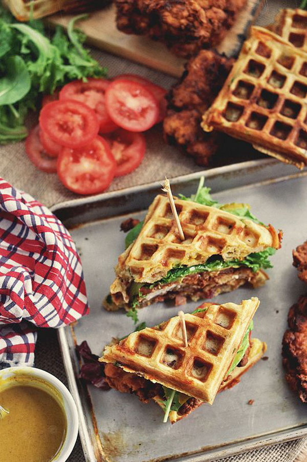 OM-F@cking-G Waffles with chicken and vegetables on a tray that is pure food porn.